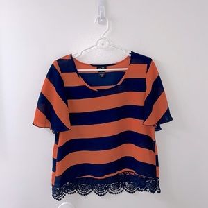 Rue21 Salmon/Navy Blue Striped Top
Lace detail at the bottom
Size M